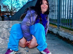 An awesome brunette Lucia Love is pissing on camera