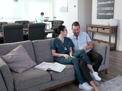 Dark-haired nurse with glasses gets screwed in the living room