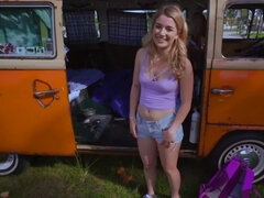 Blonde chick is being fucked in the hippie style van