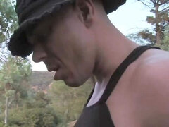 Nude titted bimbo Tori Lux is sitting on knees pleasing hard pecker in the open air