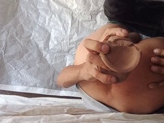 Stretching my tight pucker with a fat dildo