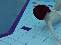 Roxalana Cheh sexy redhead underwater
