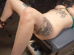 Tied to a gyno table and spread wide