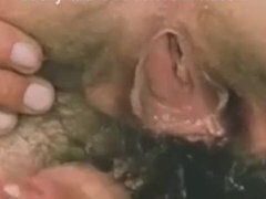 Retro cumshot video with insatiable goomah from Color Climax