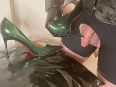 Crossdresser plays with high heel pumps and gets off with some jism