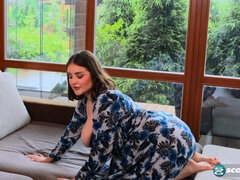 Molly Evans flaunts her massive knockers in a sultry solo session