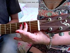 Shooting Starr Taking Guitar Lesson