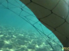 Fishnet stocking in public sea and beach