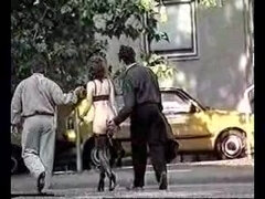 Vintage public BDSM movie of a hot brunette slave