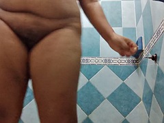 My young chubby brunette wife takes a shower