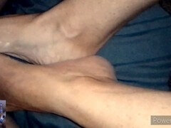 Melly gives her husband's older best friend another steamy footjob treat