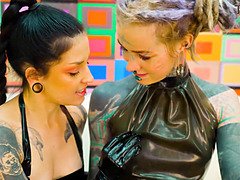 Watch these tattooed latex lovers ass stretch and fist their tight asses