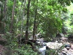 You take Elena to explore and you find a lovely waterfall.