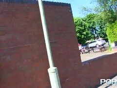 Red-Haired ebony princess urinating outdoors