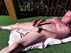 Suntanning Naked and Shooting a Big Load