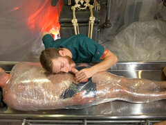 Blaze Austin is wrapped up as he lets two men do their thing