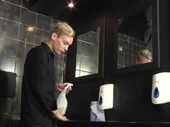 Inked blond fella deepthroats a twink in the bathroom