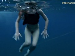 Monika in the pool and girls in the sea