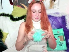 Red-haired cutie unboxes holiday gifts with some sizzling dirty talk