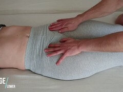 Guy explores sensitive kitty in grey yoga leggings with some gentle pawing