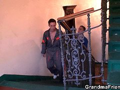 Repairmen bang busty granny from both ends in hot threesome action