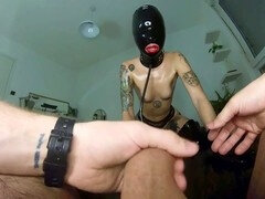 Painslut slave Anakatana gets facefucked and smacked in a latex mask while indulging in hardcore bondage