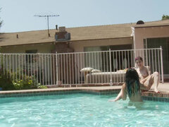 Britanny Lynn and Joanna Angel tease each other in the pool