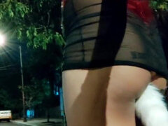 Sissy Crossdresser in Chastity Walking in the Streets at Night with a Fox Tail Anal Plug Inside Her