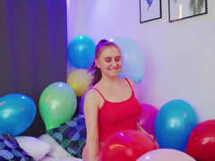 Balloon popping teaser shows her big naturals as well