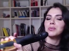 Horny brunette Valentina Nappi is playing with a curved dildo