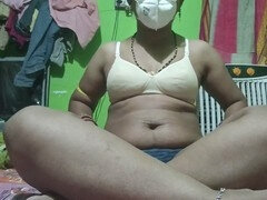 Desi village girl enjoys some solo fun fingering her pussy