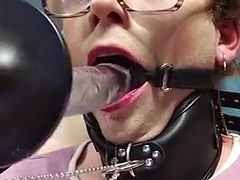 Femboy face fucked by a machine