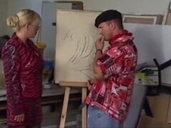 German blonde MILF in stockings is the muse to a lazy artist