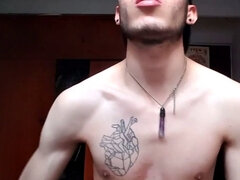 Pervert Boy bares it all for the cameras, showing off his inked body.