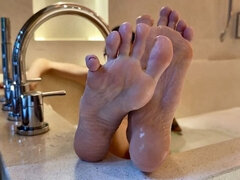 My Pink Soles in a Tub, Bare Feet with Long Toes, Wet Wrinkled Soles