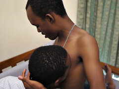 Ebony twink jerks uncut cock while barebacked