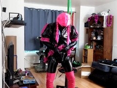 Sissy's self-restraint hanging in suspension