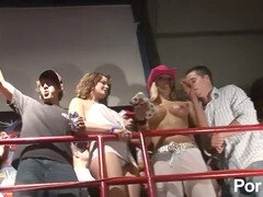 Young bare college coeds dancing and having fun in public