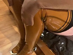 Dressing in heels and latex for a requested fetish video