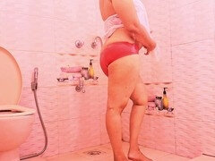 College babe strips naked in the shower