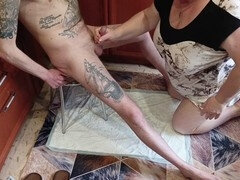 Mature stepmom gives handjob, blows and watches stepson's erection spray