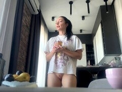 Sexy fit brunette does chores without any panties on