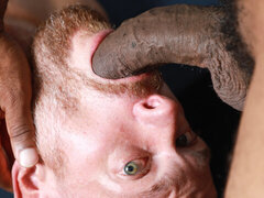 Bearded black man using all 10 inches on a submissive lad