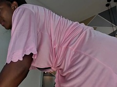 Busty Ebony sucks her big chocolate nipples on camera