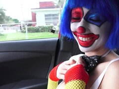 Clown girl sucks cock in a car like a real circus freak