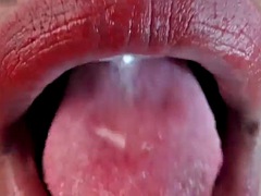 Tongue pierced ebony fetish tease spit close up