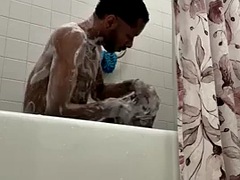 PrinceSleaze takes a shower in a bubble bath