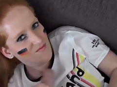 Red-haired fat pig sucks in a World Cup jersey