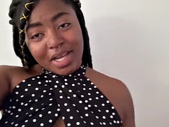 Busty African girl gets her nipples pierced