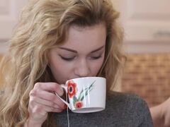 Girl with blonde hair tastes cock of guy after tea and cookies